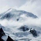 21.- Mochileros alpinistas en el Mont Blanc a 4.810m (con Asun Orts).